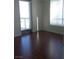 Bright bedroom with large windows and hardwood floors at 200 W Sahara Ave # 3412, Las Vegas, NV 89102