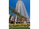 Elegant high-rise building with modern architecture and beautiful landscaping features, including palm trees at 200 W Sahara Ave # 3412, Las Vegas, NV 89102