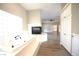 Luxurious bathroom featuring a jacuzzi, hardwood floors and an attached fireplace at 2111 Loro Ct, Las Vegas, NV 89117