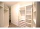 Walk-in closet with adjustable shelving and drawers for optimal organization at 2111 Loro Ct, Las Vegas, NV 89117