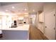 Modern kitchen featuring white cabinets, marble island, and stainless steel appliances at 2111 Loro Ct, Las Vegas, NV 89117