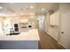 Modern kitchen featuring white cabinets, a marble island, and stainless steel appliances at 2111 Loro Ct, Las Vegas, NV 89117