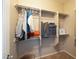 Walk-in closet with built-in shelving and organized storage at 2217 Merrimack Valley Ave, Henderson, NV 89044