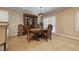 Open dining room featuring modern lighting, large windows, and a spacious carpeted area at 2217 Merrimack Valley Ave, Henderson, NV 89044