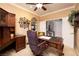 Home office with custom built-ins and rich wood desk at 2217 Merrimack Valley Ave, Henderson, NV 89044