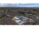Scenic aerial view of a house surrounded by a neighborhood landscape with mountain views at 261 W Cypress Dr, Henderson, NV 89015