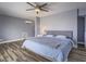Bedroom features a comfortable bed, modern decor, and ample space at 261 W Cypress Dr, Henderson, NV 89015