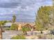 Charming single-Gathering home with manicured landscaping and mountain views at 261 W Cypress Dr, Henderson, NV 89015