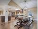 Spacious kitchen flows into the dining area, featuring matching dark wood cabinetry at 261 W Cypress Dr, Henderson, NV 89015