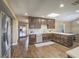 This stylish kitchen features modern appliances, wood floors, and bright countertops at 261 W Cypress Dr, Henderson, NV 89015
