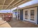 Cozy covered patio with outdoor seating, perfect for entertaining and relaxing at 261 W Cypress Dr, Henderson, NV 89015