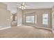 Spacious main bedroom with light walls, hardwood floors and a view to a bath at 2617 Huber Heights Dr, Las Vegas, NV 89128