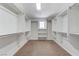 Large walk-in closet with shelving and hanging rods, offering plenty of storage space at 2617 Romarin Ter, Henderson, NV 89044