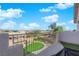 Balcony with a beautiful view overlooking a well manicured lawn and landscaping at 2682 Korea Ct, Henderson, NV 89052