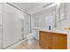 Clean bathroom featuring a glass shower and a light wood vanity at 2682 Korea Ct, Henderson, NV 89052