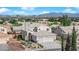 Exterior view of a two story home, showcasing manicured landscaping and a multi-car garage at 2682 Korea Ct, Henderson, NV 89052