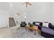 Open-concept living room with high ceilings and neutral decor at 2682 Korea Ct, Henderson, NV 89052
