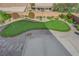 Aerial view of a backyard putting green, perfect for the avid golfer at 2682 Korea Ct, Henderson, NV 89052