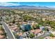Beautiful aerial view of neighborhood featuring mature landscaping, tile roofs, and well maintained homes at 2812 Shadow Creek Cir, Las Vegas, NV 89117