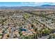 An aerial view displays the desirable suburban neighborhood with mature trees and well-maintained landscaping at 2812 Shadow Creek Cir, Las Vegas, NV 89117