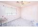 Unfurnished bedroom with a window and carpeted floor at 2812 Shadow Creek Cir, Las Vegas, NV 89117