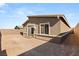 A blank canvas of a backyard awaits your landscaping ideas and outdoor enjoyment with privacy wall at 283 Fossil Falls St, Henderson, NV 89015