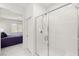 Shower with white subway tiles and glass door opens to bedroom at 283 Fossil Falls St, Henderson, NV 89015