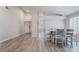 Spacious living area with a dining table, comfortable seating, and large windows providing plenty of light at 289 Garwood Ct, Henderson, NV 89074