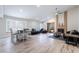 Open-concept living space with dining area, fireplace, and stylish furnishings at 289 Garwood Ct, Henderson, NV 89074