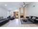 Inviting living room with modern furniture, a cozy fireplace, and ample natural light at 289 Garwood Ct, Henderson, NV 89074