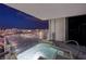 Balcony hot tub with stunning city views at night at 4381 W Flamingo Rd # 5502, Las Vegas, NV 89103