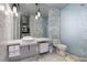 Modern bathroom featuring marble countertops, contemporary fixtures, and ample lighting at 4381 W Flamingo Rd # 5502, Las Vegas, NV 89103