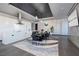 Contemporary kitchen with a large island, integrated appliances, and adjacent stylish dining area at 4381 W Flamingo Rd # 5502, Las Vegas, NV 89103
