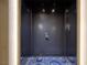 Elegant condo entrance with modern door, keyless entry, and stylish wall accents at 4381 W Flamingo Rd # 5502, Las Vegas, NV 89103