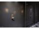 Modern condo entrance door with a sleek, dark finish and a stylish, keyless entry system at 4381 W Flamingo Rd # 5502, Las Vegas, NV 89103