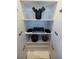 Neatly arranged kitchen cabinet interior with utensils, cookware, and padded surfaces on the shelves at 4381 W Flamingo Rd # 5502, Las Vegas, NV 89103