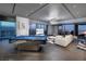 Modern living room with city views, a pool table, and stylish furnishings at 4381 W Flamingo Rd # 5502, Las Vegas, NV 89103