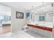 Bright bathroom featuring a double vanity, modern fixtures, toilet and minimalist design at 4471 Dean Martin Dr # 1707, Las Vegas, NV 89103