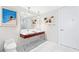 Bright bathroom featuring a double vanity, modern fixtures and minimalist design at 4471 Dean Martin Dr # 1707, Las Vegas, NV 89103