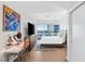 Bright bedroom with a work space and expansive city views from floor-to-ceiling windows at 4471 Dean Martin Dr # 1707, Las Vegas, NV 89103