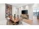 Dining area features a modern table, stylish lighting, and city views, creating an inviting atmosphere at 4471 Dean Martin Dr # 1707, Las Vegas, NV 89103