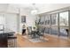 Bright dining area with modern chandelier and city views at 4471 Dean Martin Dr # 1707, Las Vegas, NV 89103