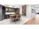 Elegant dining area with a custom wine cabinet, artwork, and stylish lighting, perfect for entertaining at 4471 Dean Martin Dr # 1707, Las Vegas, NV 89103