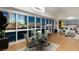 Bright dining room featuring a glass table, chandelier, and panoramic city views through expansive windows at 4471 Dean Martin Dr # 1707, Las Vegas, NV 89103