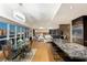 Open-concept living area with modern furnishings, sleek kitchen, and floor-to-ceiling windows with city views at 4471 Dean Martin Dr # 1707, Las Vegas, NV 89103