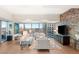 Contemporary living room featuring stylish furniture, floor-to-ceiling windows showcasing city views, and modern decor at 4471 Dean Martin Dr # 1707, Las Vegas, NV 89103