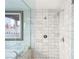 Modern bathroom featuring a glass-enclosed shower and marble tile at 4471 Dean Martin Dr # 1707, Las Vegas, NV 89103