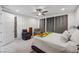 Relaxing bedroom with plush carpeting, soft lighting, and comfortable seating at 4557 E Cactus Canyon Dr, Pahrump, NV 89061