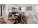 Spacious dining room boasts a large table, perfect for Gathering meals and gatherings, with stylish decor at 4557 E Cactus Canyon Dr, Pahrump, NV 89061