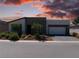 Charming single-story home with a modern exterior and inviting curb appeal at 4557 E Cactus Canyon Dr, Pahrump, NV 89061